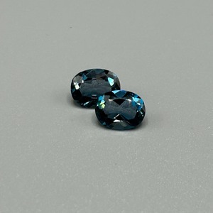 lot 134 image: 4.70 Carat London Blue Topaz Faceted Oval Cut - Set of 2 Loose Stones