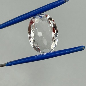 lot 135 image: 9.35 Carat Rock Crystal Colorless Quartz Faceted Oval Cut