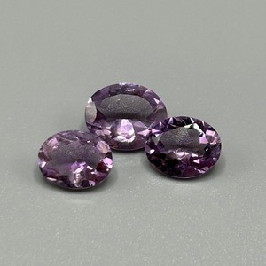 lot 163 image: 6.79 Carat Amethyst Faceted Oval Cut - Set of 3 Loose Stones