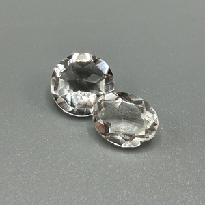 lot 176 image: 5.54 Carat Colorless Crystal Faceted Round & Oval Cut - Set of 2 Loose Stones
