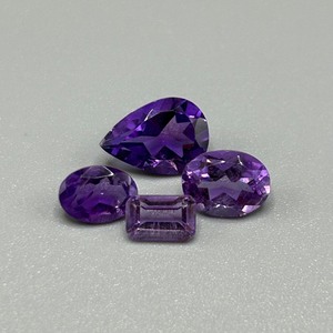 lot 188 image: 4.17 Carat Amethyst Faceted Mixed Cut - Assorted Size & Shape Set of 4 Loose Stones