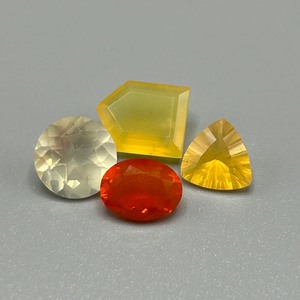 lot 190 image: 4.98 Carat Fire Opal Faceted Mixed Cut - Various Color, Size & Shape Set of 4 Loose Stones