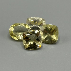 lot 207 image: 14.28 Carat Yellow Gems Faceted Mixed Cut - Various Size & Shape Set of 4 Loose Stones