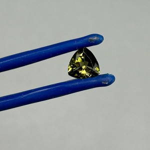 lot 212 image: 0.74 Carat Yellow Green Tourmaline Faceted Trillion Triangular Cut