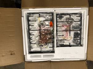 lot 42 image: Galanz 24 in. Gas Cooktop in Stainless Steel with 4 Burners including Triple Ring Power Burner and Simmer Burner  Customer Returns See Pictures