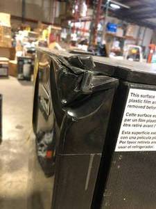 lot 4 image: Magic Chef 10.1 cu. ft. Top Freezer Refrigerator in Black Damaged  Customer Returns See Pictures