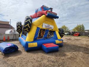 lot 106 image: Space Walk Monster Truck Inflatable
