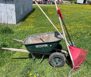 lot 6 image: Craftsman wheel barrel and lawn and garden tools