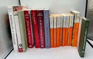 lot 27 image: Lot of 16 books and wicker basket