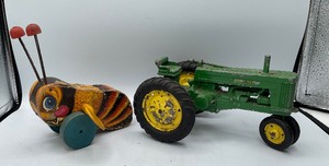 lot 28 image: Vintage John Deere Toy Tractor and Buzzy Bee Toy