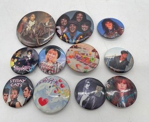 lot 99 image: Vintage Pinback Buttons, 1980s Prince, Tiffany, Debbie Gibson