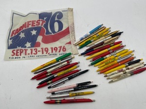 lot 102 image: Approximately 30 untested Farm Implement Dealer Pens, Farmfest Banner 1976