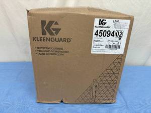 lot 55 image: MSRP $350  1 Case (24 each) NEW Kleenguard 45094&nbspBlood and Chemical Splash Protection Hooded & Booted Denim Coveralls - Size XL Blue