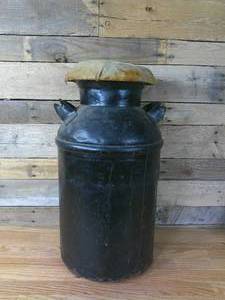 lot 32 image: 24 Milk Jug Stool