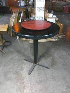lot 99 image: 41 Tall Black Bar Table with 22 Swivel Top