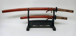 lot 7 image: Pair of Vintage Katanas on Stand