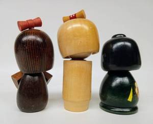 lot 6 image: Trio of Vintage Wooden TOMIO ISHIDA Kokeshi Dolls