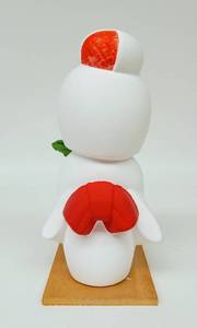 lot 13 image: Vintage Ishikawa Doll with Flower