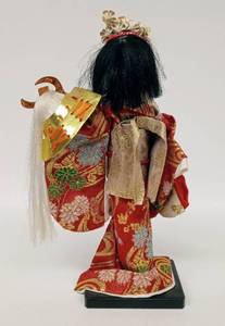 lot 14 image: Vintage Geisha Doll Holding a Samurai Helmet
