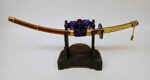 lot 21 image: Mid-Century Miniature Katana and Kabuto Helmet