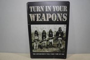 lot 29 image: Metal Sign Turn in Your Weapons