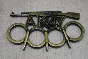 lot 32 image: Gun Paper Weight