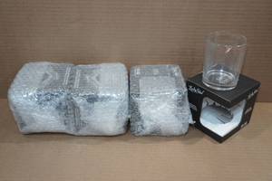 lot 75 image: 4 Lucky Shot Rocks Glasses with Embedded Bullets