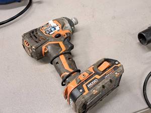 lot 170 image: Ridgid 14 18V Impact Driver R86034 with Battery