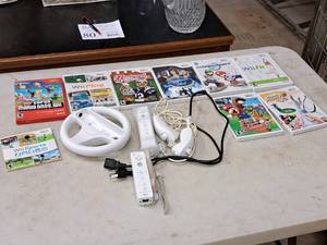 lot 73 image: Wii Games, Controllers and Accessories