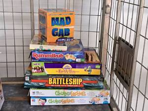 lot 103 image: Lot of (7) Assorted Board Games - Mad Gab, Rummikub, Family Fun, Battleship, Chutes & Ladders