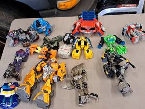 lot 144 image: Lot of (15) Assorted Transformer Action Figures