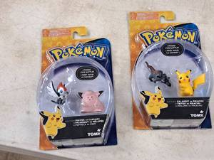 lot 165 image: Lot of (2) Tomy Pokemon Collectibles (in original packaging) - Pikipek vs Clefairy, Salandit vs Pikachu