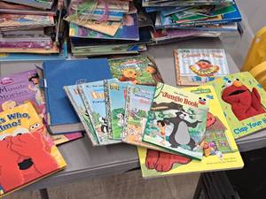 lot 202 image: Lot of (12) Assorted Disney and Sesame Street Books - Guess Who Elmo, The Jungle Book, Count To 10, Rhyme Time and more