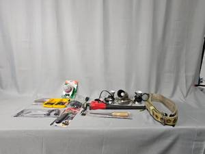 Lot of Garage Items Inc 3 LampsSpotlight, Tire Gauge, Hack Saw, Incomplete Set of Drill Bits, Large Wrench, Heavy Duty Belt (possibly tree belt) & More
