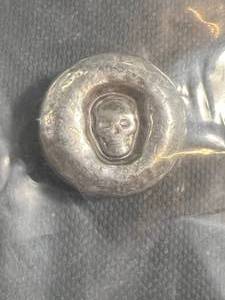 1 TROY OZ .999 FINE SILVER HAND POURED SKULL ROUND
