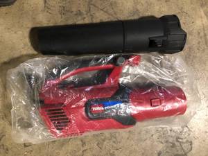 lot 7 image: Toro PowerJet F700 140 MPH 725 CFM 12 Amp Electric Handheld Leaf Blower Customer Returns See Pictures