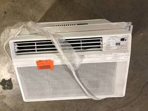 lot 16 image: LG 12,000 BTU 115V Window Air Conditioner Cools 550 sq. ft. with Wi-Fi, Remote and in White  Customer Returns See Pictures