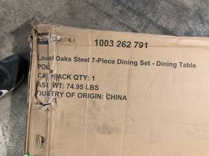 lot 12 image: Laurel Oaks Brown Metal Outdoor Dining Table by Hampton Bay Customer Returns See Pictures