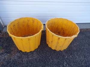 lot 14 image: Pair of Yellow Tubs make great planters