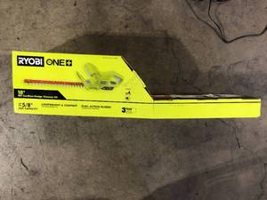 lot 31 image: RYOBI ONE 18V 18 in. Cordless Battery Hedge Trimmer with 1.5 Ah Battery and Charger  Customer Returns See Pictures