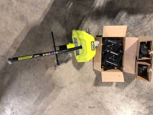 lot 12 image: RYOBI Expand-It Universal Tiller String Trimmer Attachment  Customer Returns See Pictures