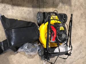 lot 13 image: DEWALT 21 in. 150cc Briggs and Stratton 625ex Engine Rear Wheel Drive 2-in-1 Gas Self Propelled Walk Behind Lawn Mower Customer Returns See Pictures