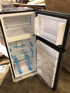lot 23 image: Magic Chef 18.5 in. W, 4.5 cu. ft. 2-Door Mini Refrigerator, with Freezer in Platinum Steel Slight Damage on Top Corner   Customer Returns See Pictures