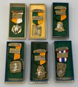 lot 4 image: 1960s-70s  St. Croix Valley Rod & Gun Club Shooting Metals In Original Cases