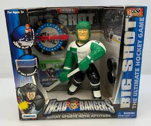 lot 73 image: Vintage Big Shot GreenWhite Head Bangers Hockey Player (NIB)