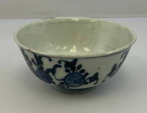 lot 88 image: Chinese Antique Porclain Quing dynasty  4 58 Cup With Symbol Etched On Side (Cup has hairline Crack and Chips On Rim) Very Cool