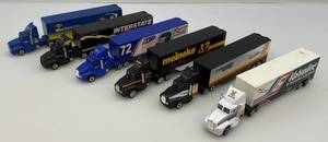 lot 115 image: Misc. Miniature NASCAR Semi Trucks
