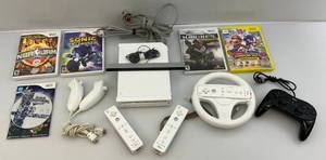 lot 164 image: Vintage WII With Some Games