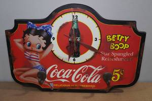 lot 31 image: Coca-Cola Betty Boop Clock & Coat Rack