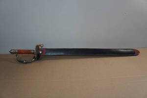 lot 146 image: Snake Tail Handle Sword